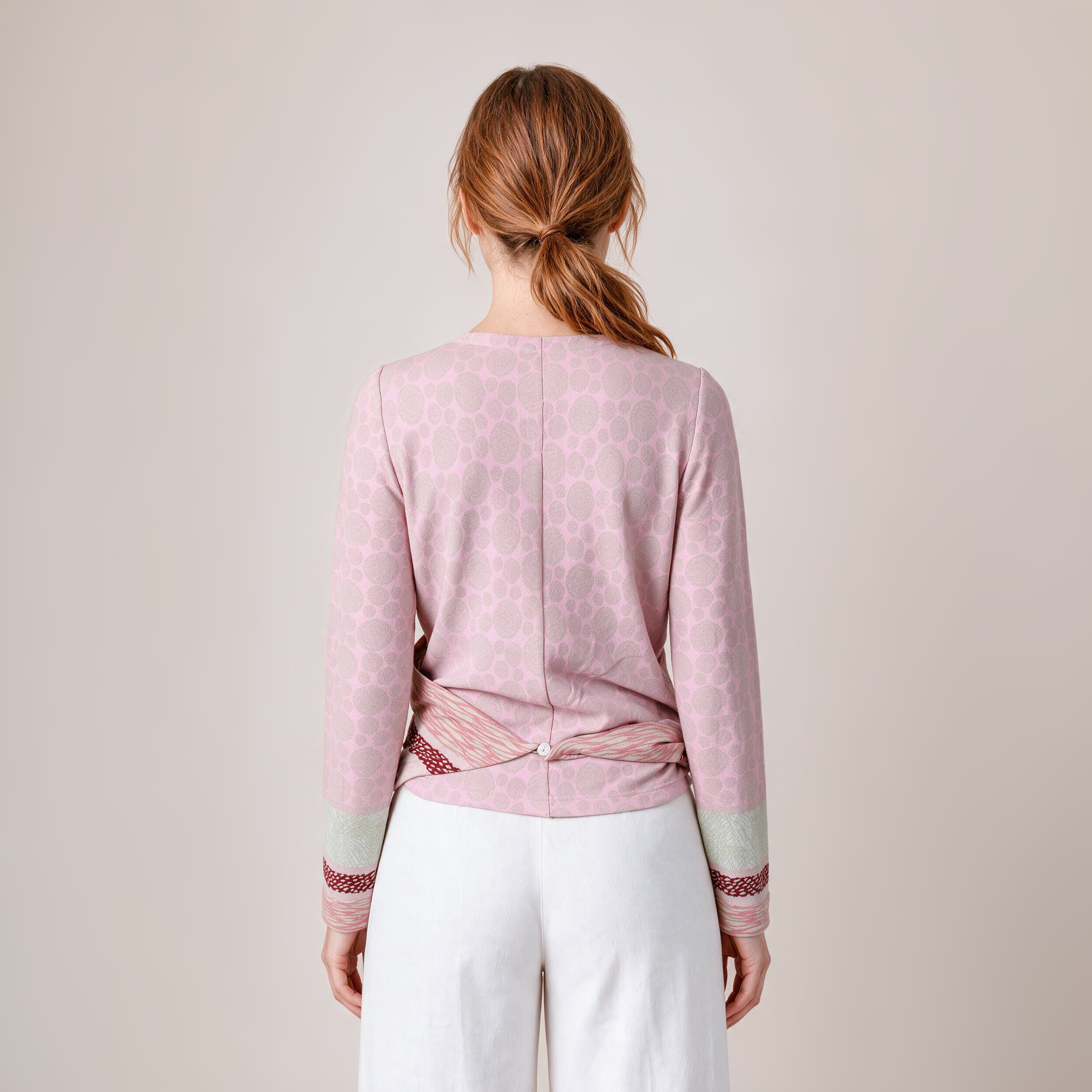 Wickeljacke rosa – Rückansicht